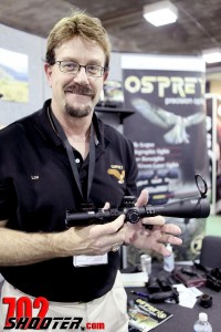 Lou Pagley holds the TA41650MDG 4-16x50 Tactical Rifle Scope